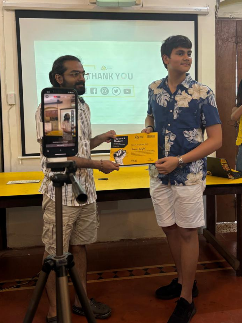 Pranay receiving a Maker certificate